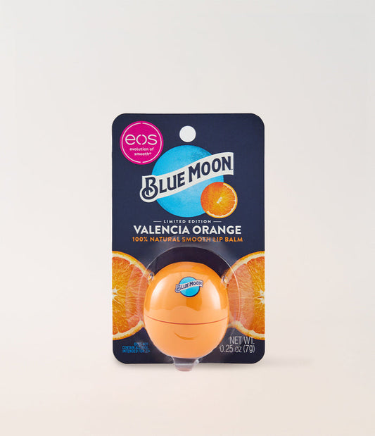 Blue Moon Valencia Orange lip balm packaging on a light gray background