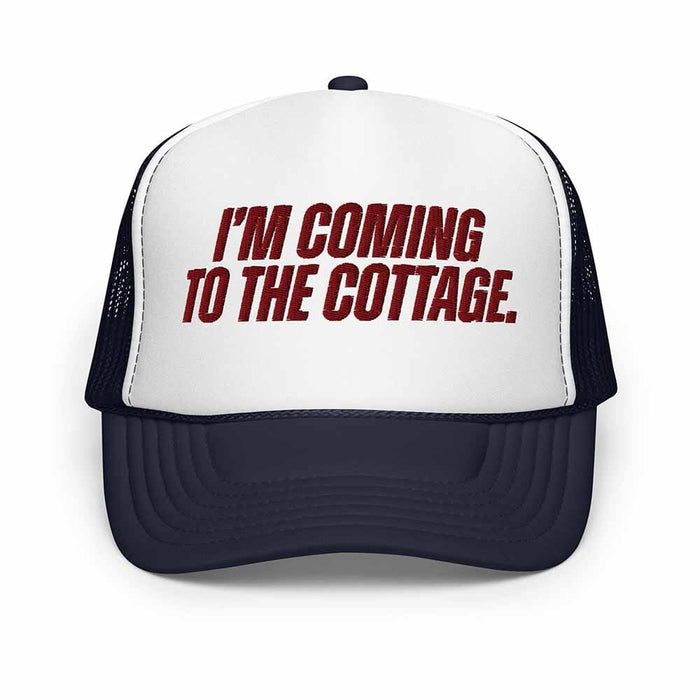 Navy and white Trucker hat with 'I'm Coming to the Cottage' text on a white background